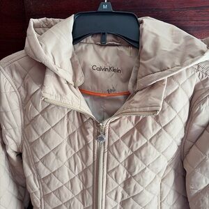 Calvin Klein brand new quilt jacket.khaki color